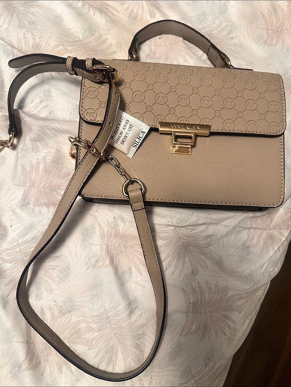 Anne Klein Monogram Turnlock Top Handle Crossbody Bag Brown